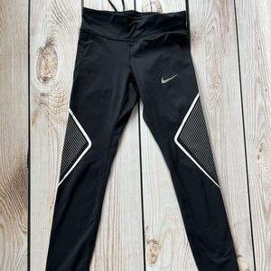 Nike Dri-Fit black leggings w/ white stripe detail